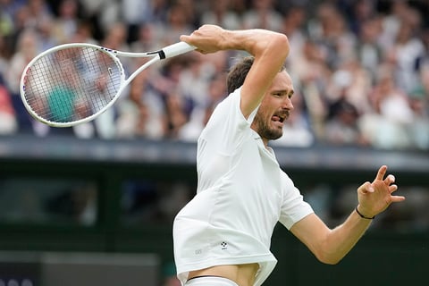 Daniil Medvedev return the ball to Jannik Sinner